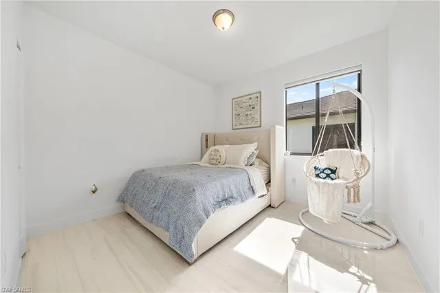 a bathroom with a sink and shower