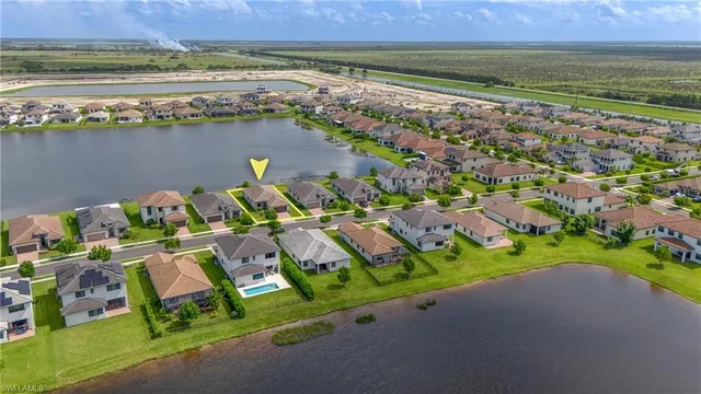 a view of a lake with a building in the background