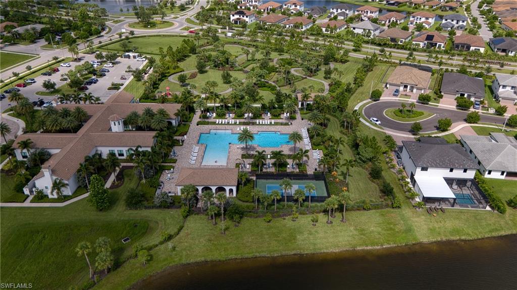 4951 Brigata Way Avenue Immokalee, FL 34142 - Photo 40 of 49 an aerial view of a house with a yard