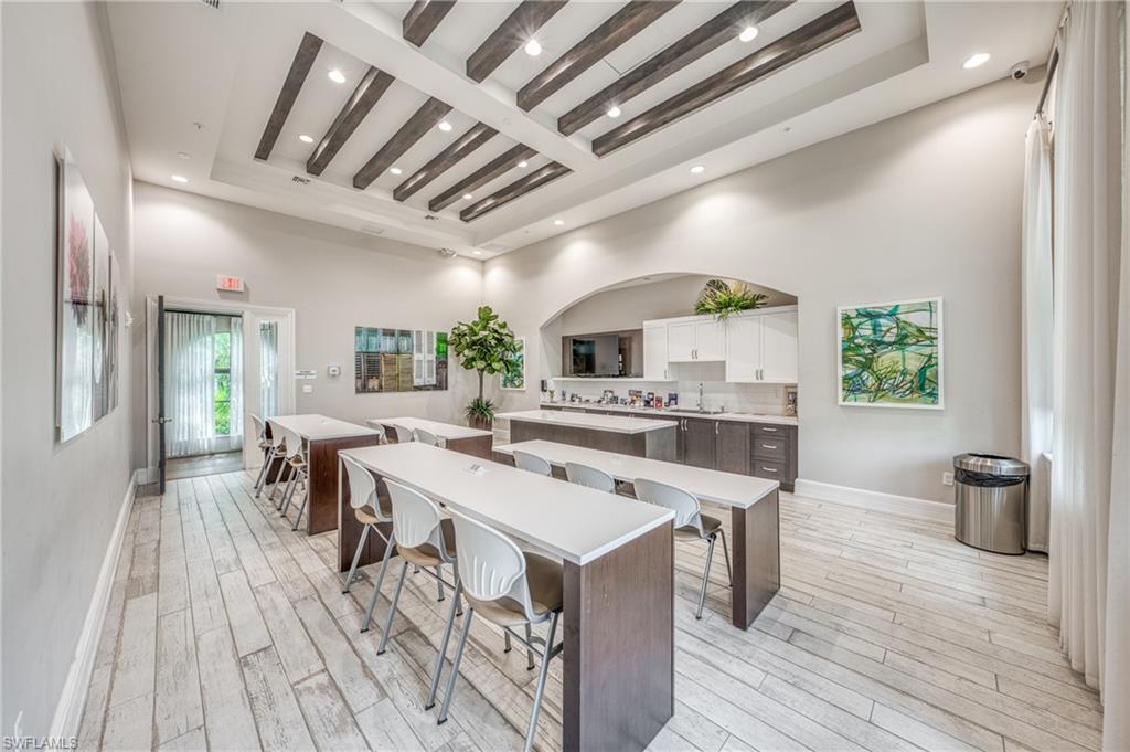 4951 Brigata Way Avenue Immokalee, FL 34142 - Photo 47 of 49 a kitchen with a sink and wooden floor