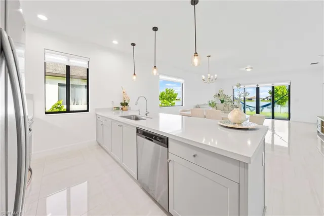 a kitchen with a sink and counter space