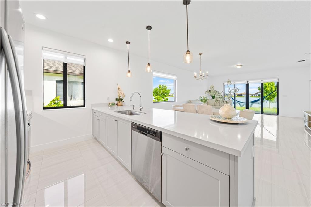 4951 Brigata Way Avenue Immokalee, FL 34142 - Photo 7 of 49 a kitchen with a sink and counter space