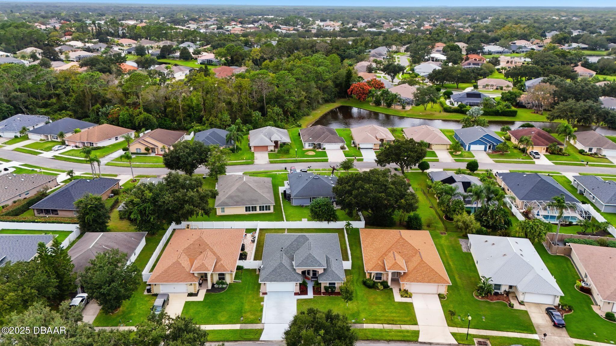 6127 Sabal Point Circle Port Orange, FL 32128 - Photo 46 of 53 an aerial view of house with yard swimming pool and ocean view
