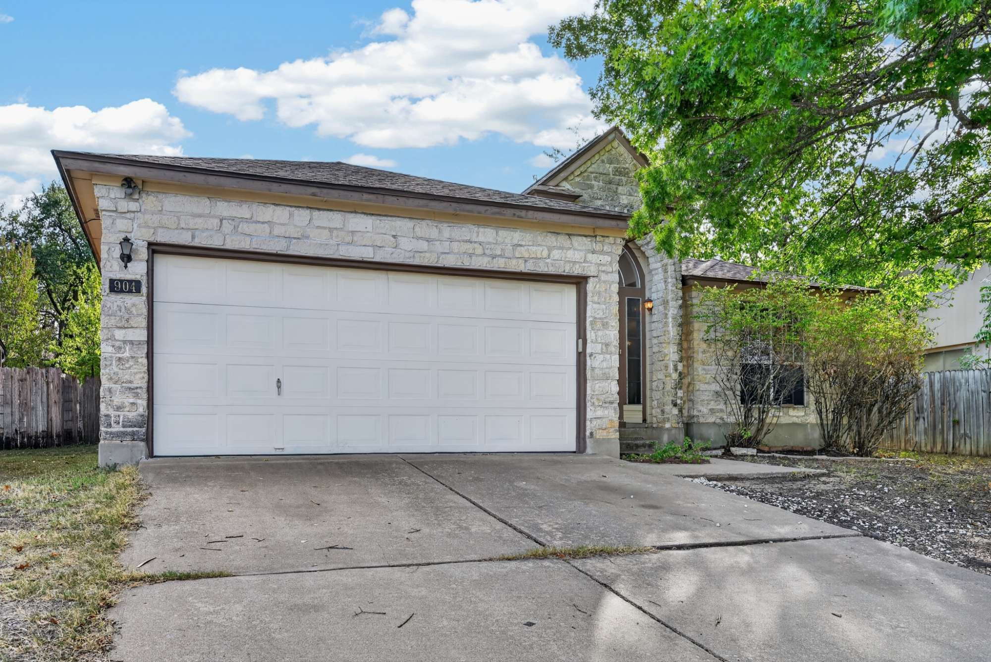 904 Nelson Ranch Road Cedar Park, TX 78613 - Photo 2 of 21 Stone masonry accents the front exterior of this single-family home with an attached garage.