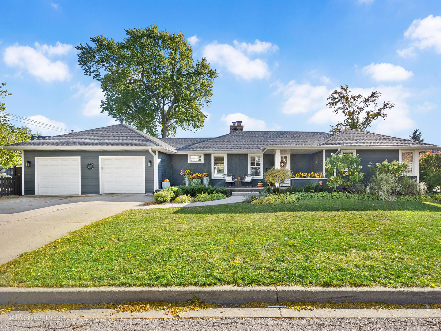 448 West Vallette Street Elmhurst, IL 60126 - Photo 1 of 30 a front view of a house with garden