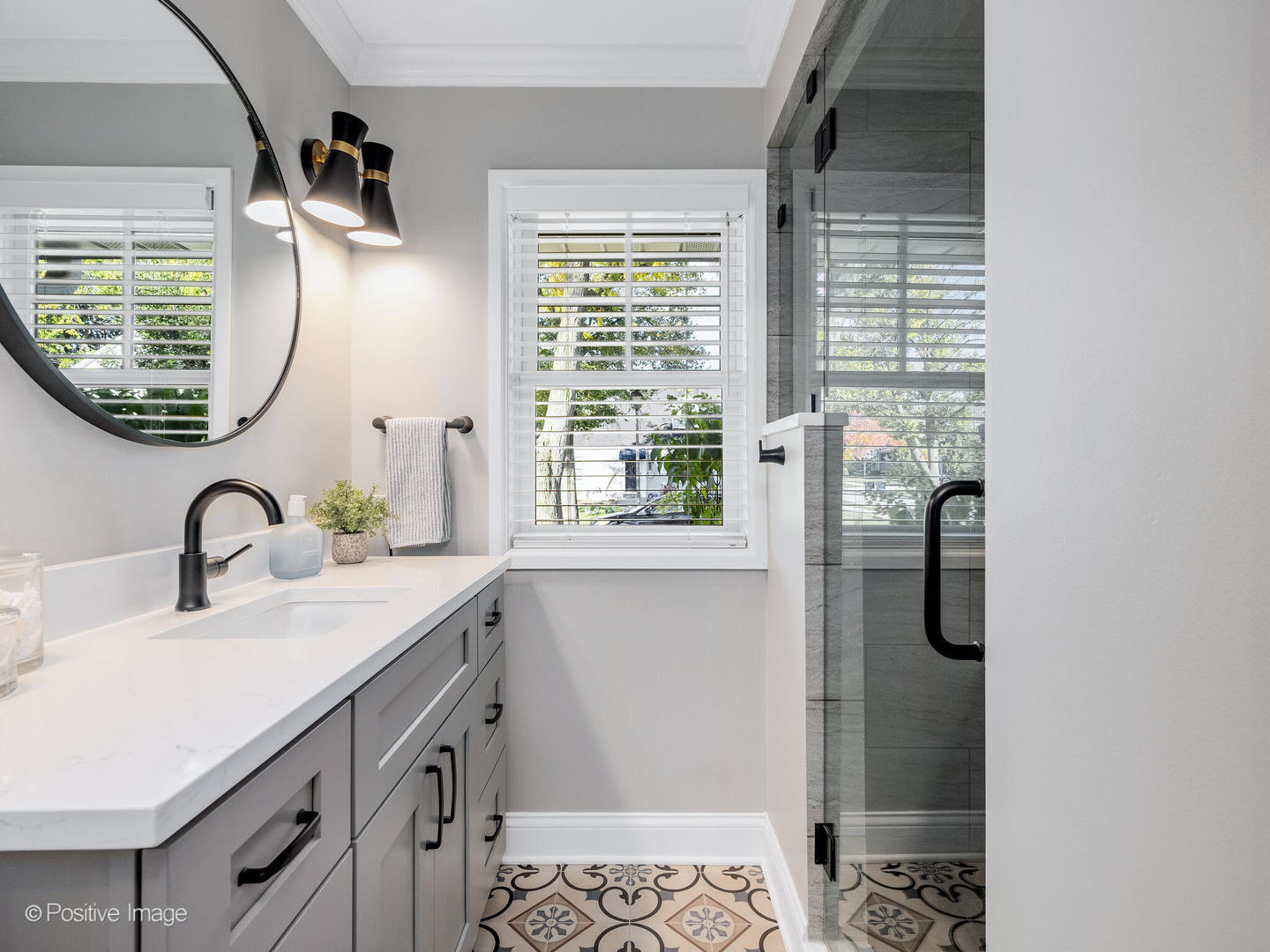 448 West Vallette Street Elmhurst, IL 60126 - Photo 20 of 30 a bathroom with a sink and a mirror