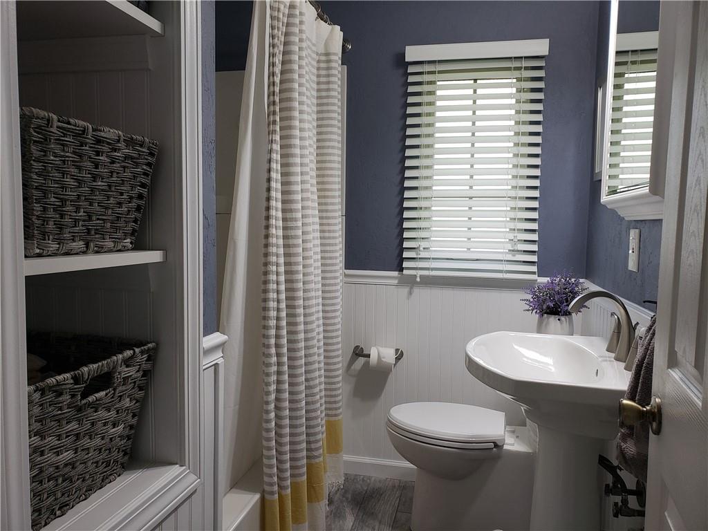 13861 Ridge Road North Huntingdon, PA 15642 - Photo 8 of 20 a bathroom with a sink a toilet and shower