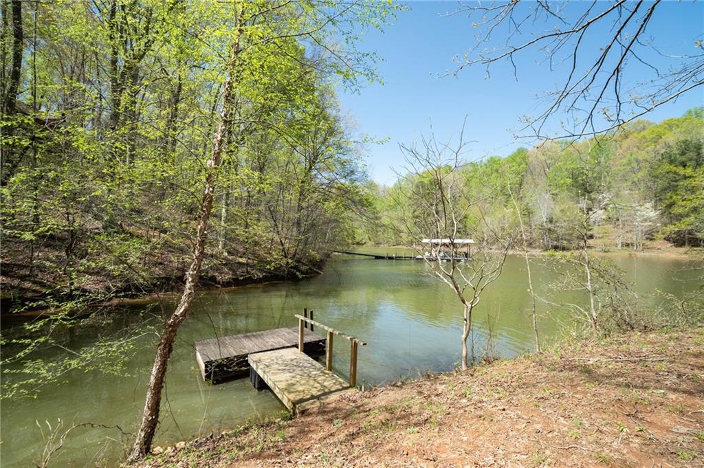 1279 Coneross Point Drive Seneca, SC 29678 - Photo 42 of 48 Photo was taken when lake was at full pool and doesn't reflect the lake being below full pool at this time.