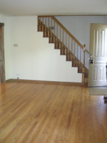 607 Elmhurst Road Mount Prospect, IL 60056 - Photo 18 of 24 a view of an entryway with wooden floor