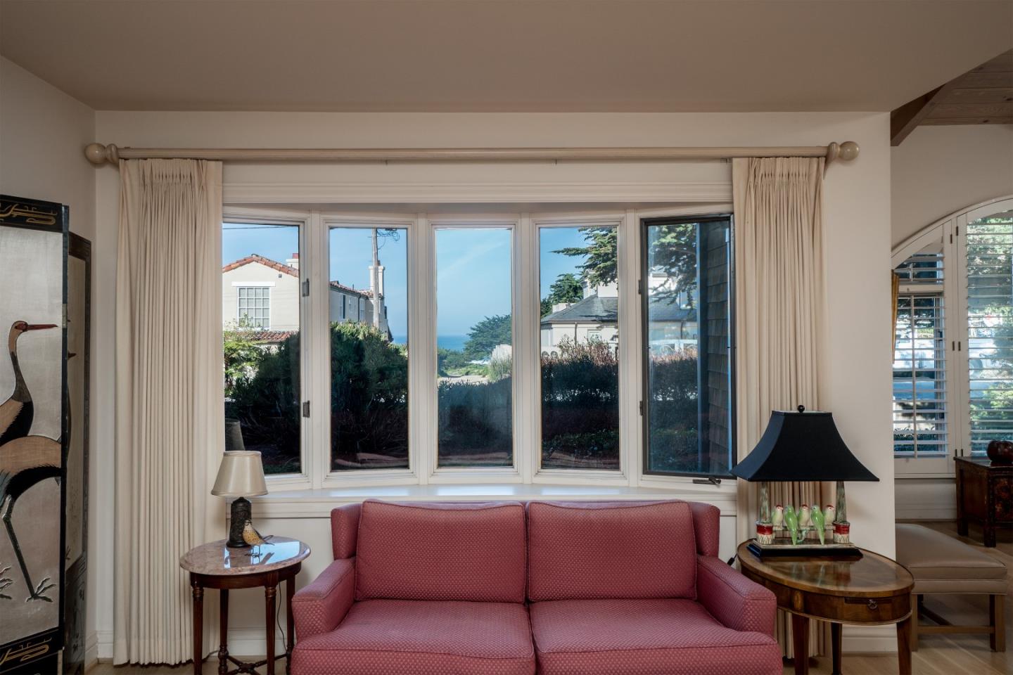 3011 Cormorant Road Pebble Beach, CA 93953 - Photo 12 of 37 a living room with furniture and a large window
