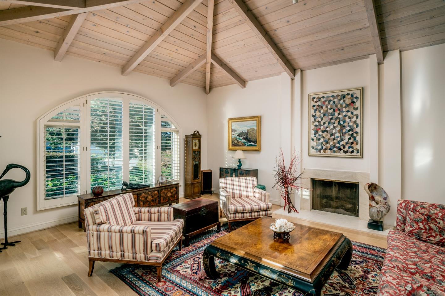 3011 Cormorant Road Pebble Beach, CA 93953 - Photo 15 of 37 a living room with furniture fireplace and a large window
