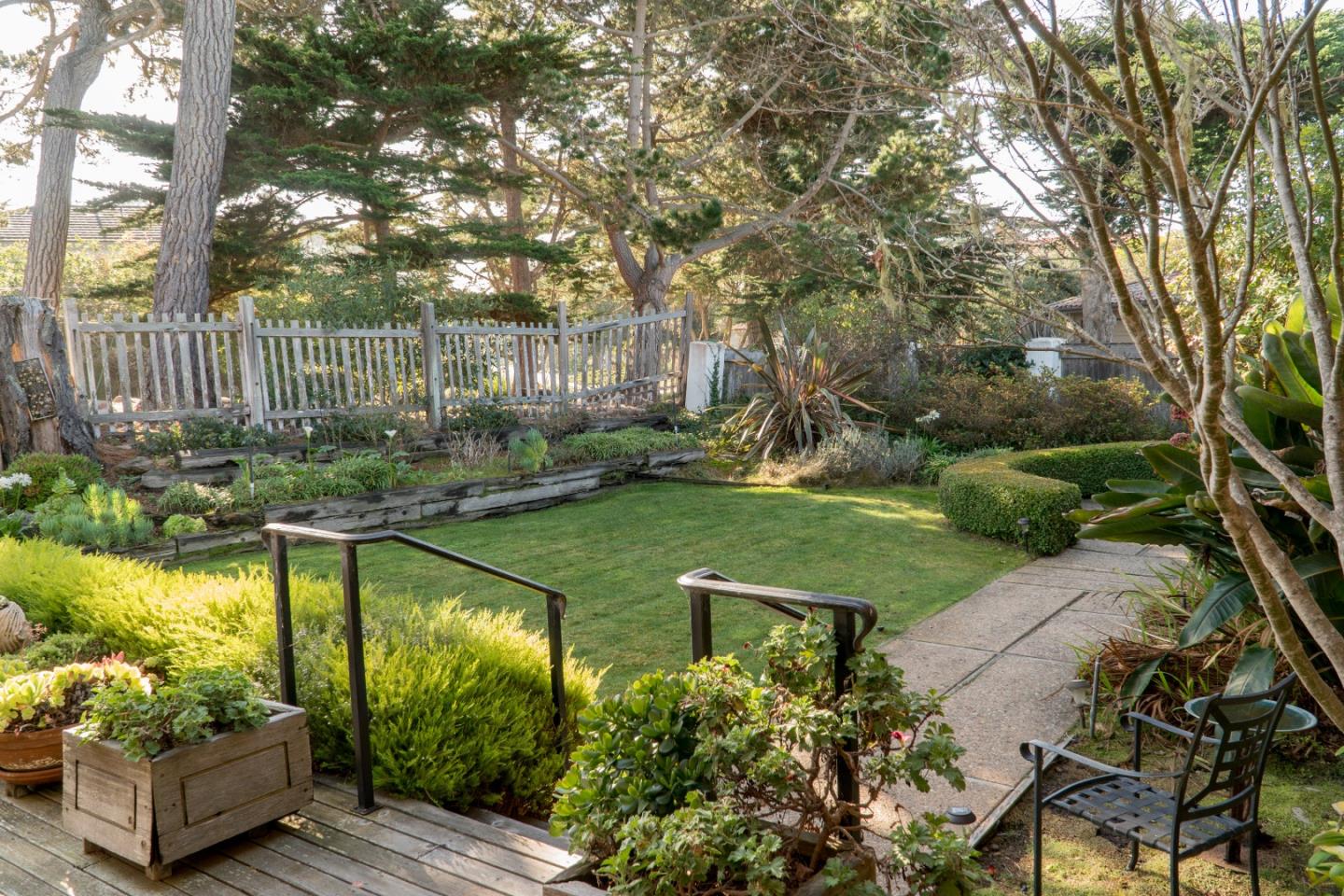 3011 Cormorant Road Pebble Beach, CA 93953 - Photo 30 of 37 a view of a garden with wooden fence