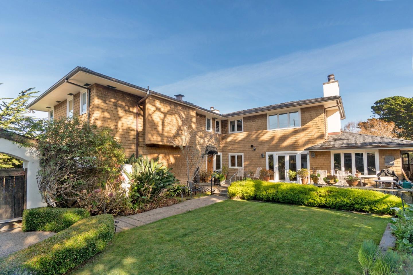 3011 Cormorant Road Pebble Beach, CA 93953 - Photo 31 of 37 a front view of a house with a yard