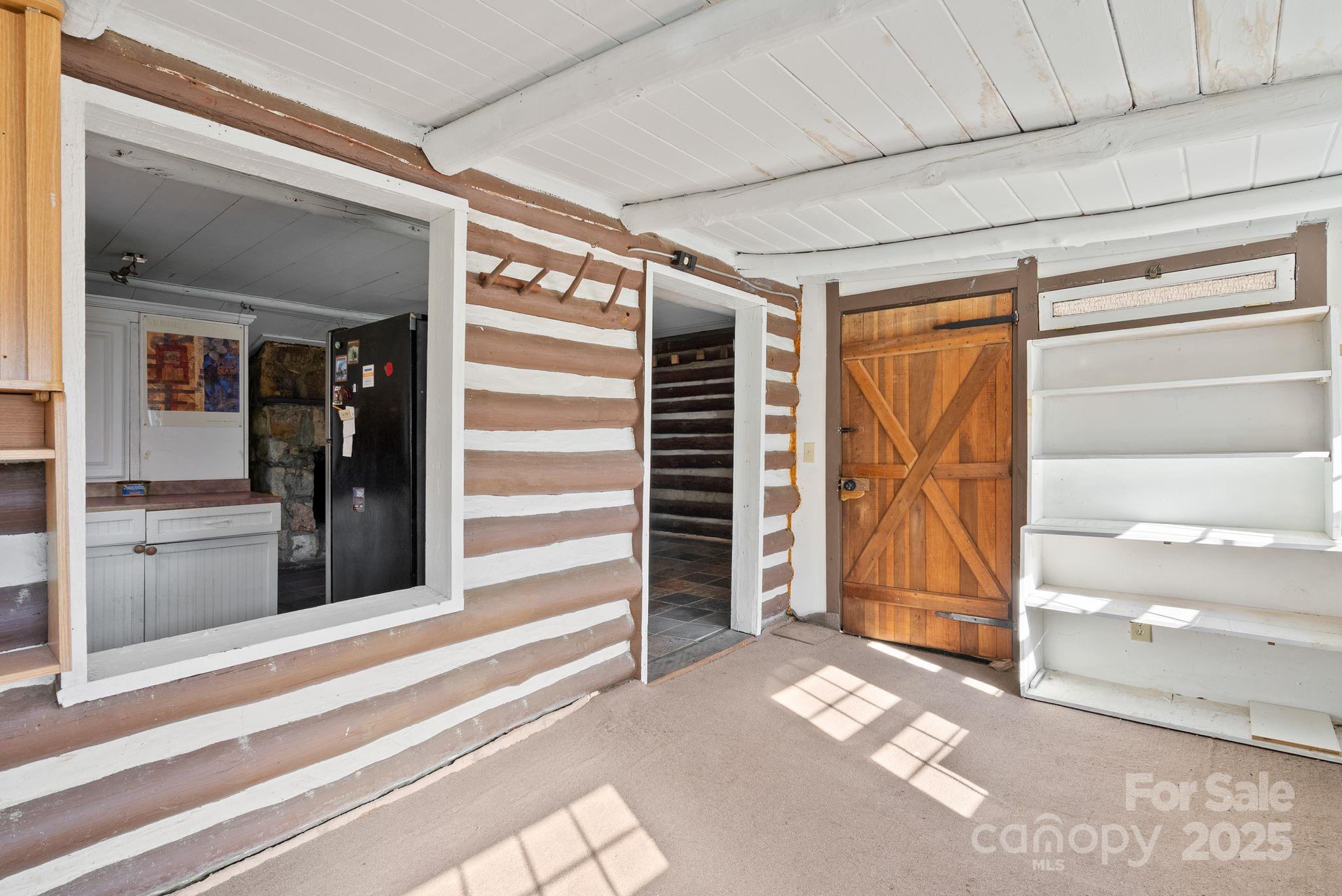 849 South Ammons Branch Road Marshall, NC 28753 - Photo 12 of 20 a view of a entrance door of the house