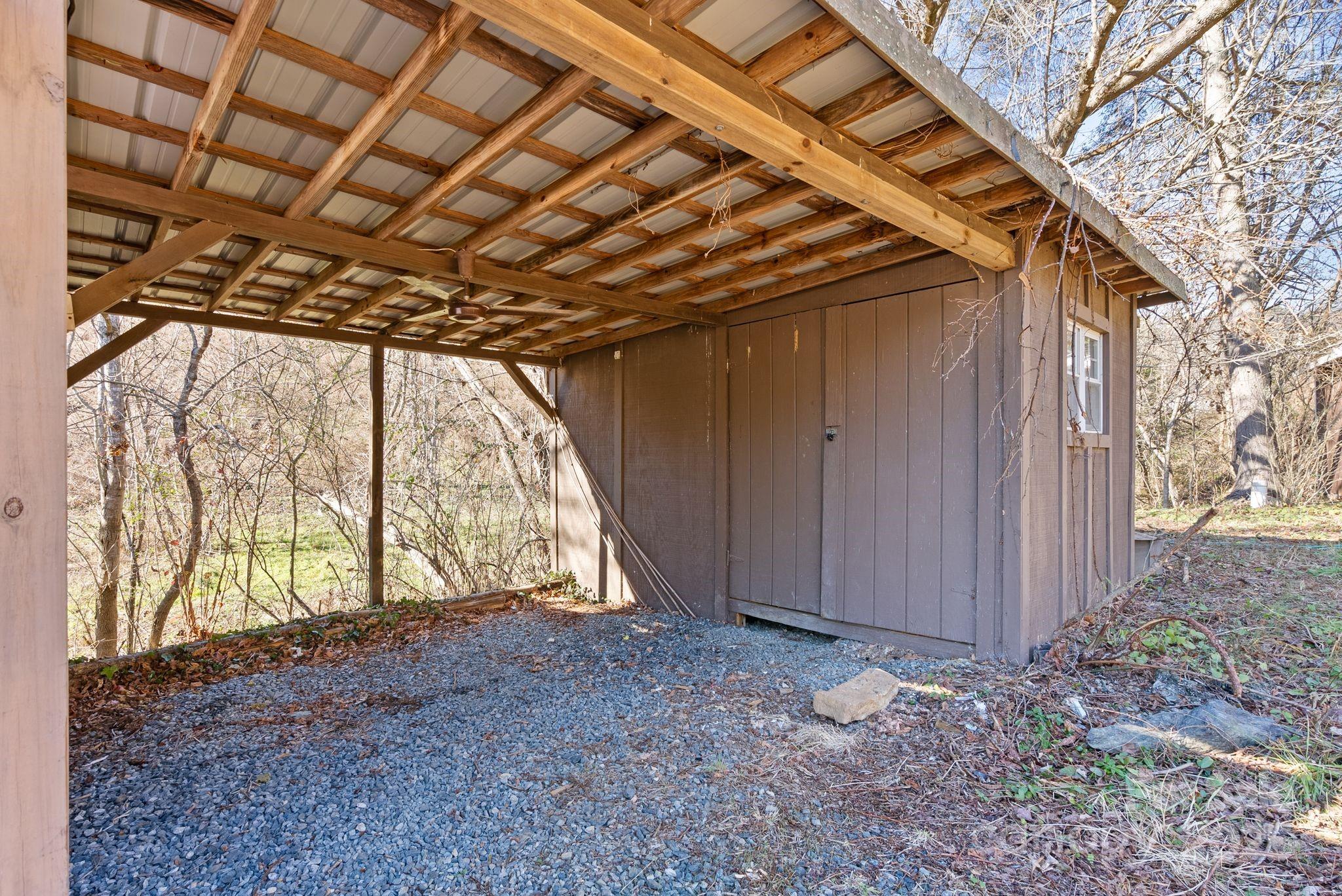 849 South Ammons Branch Road Marshall, NC 28753 - Photo 18 of 20 a view of empty room with large windows