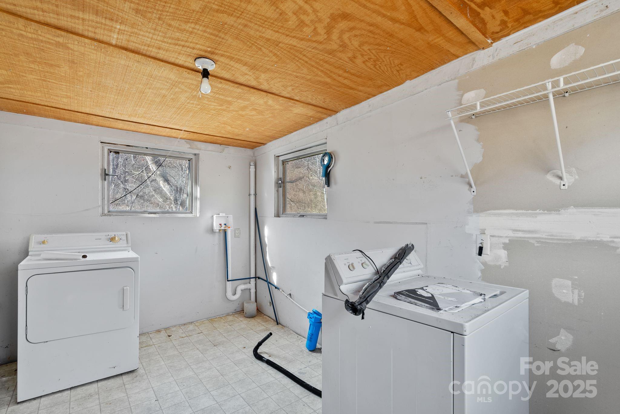 849 South Ammons Branch Road Marshall, NC 28753 - Photo 19 of 20 a utility room with dryer and washer