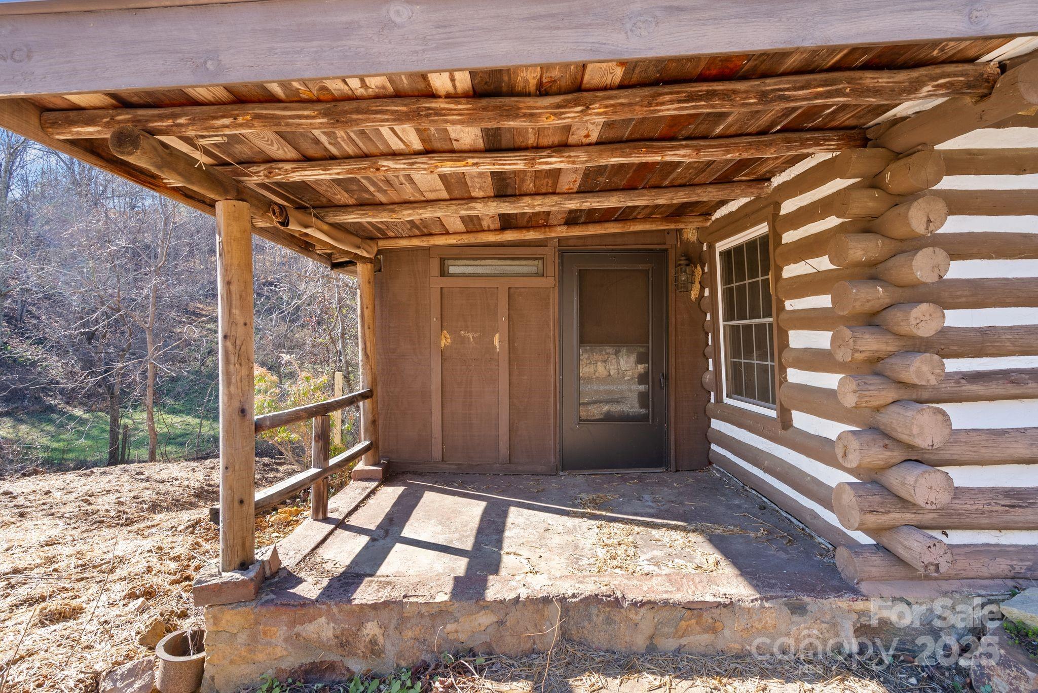 849 South Ammons Branch Road Marshall, NC 28753 - Photo 4 of 20 a view of an outdoor space
