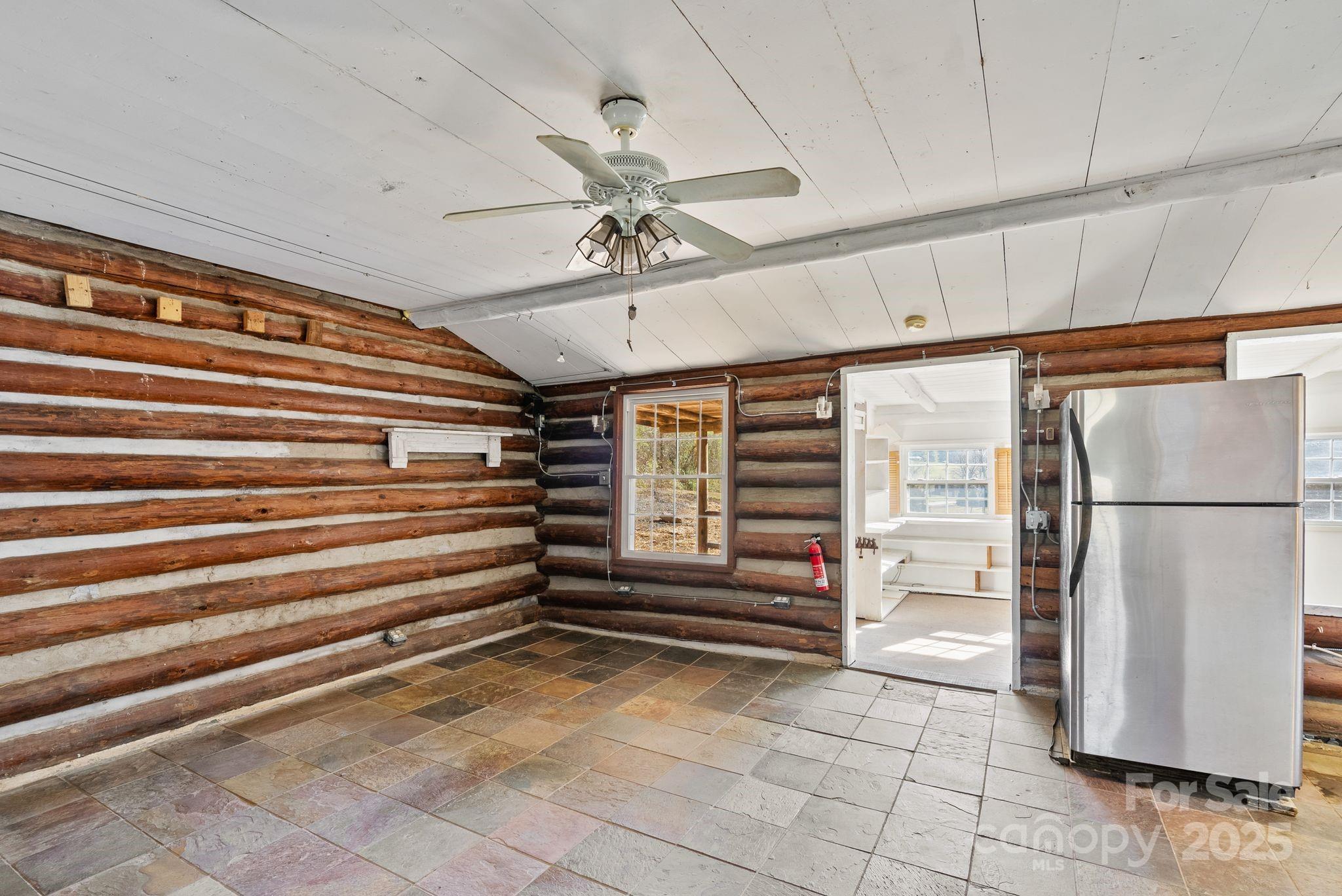849 South Ammons Branch Road Marshall, NC 28753 - Photo 10 of 20 a view of walk in closet with empty racks