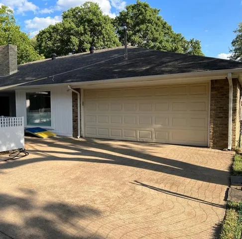 a view of backyard with a small cabin