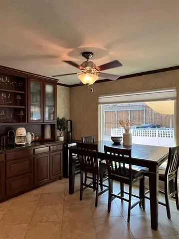 a view of a dining room with furniture
