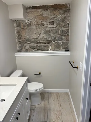 a bathroom with a sink and a toilet
