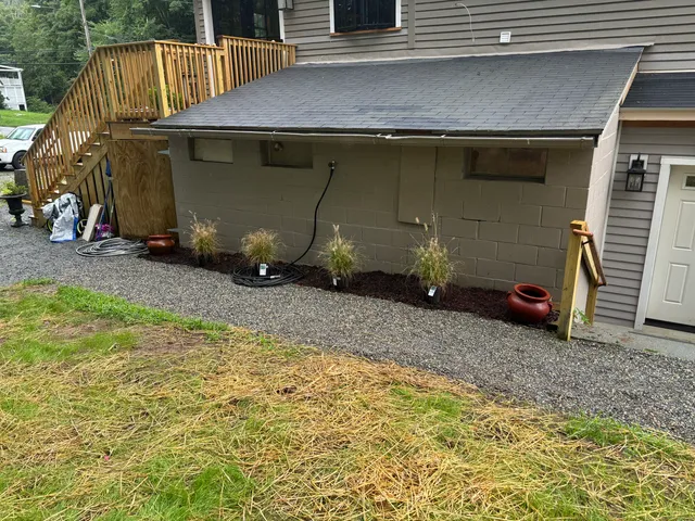 a view of a house with backyard and entertaining space