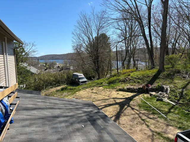a view of a backyard with plants