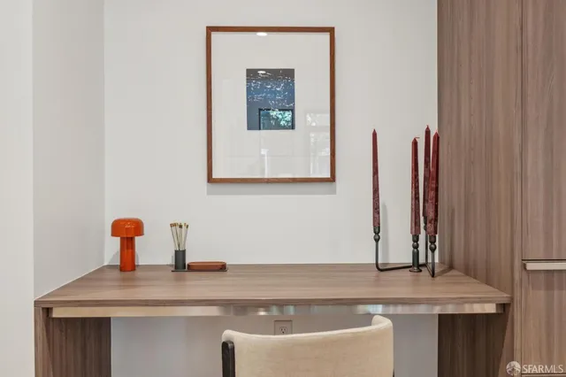 a room with a sink and a mirror