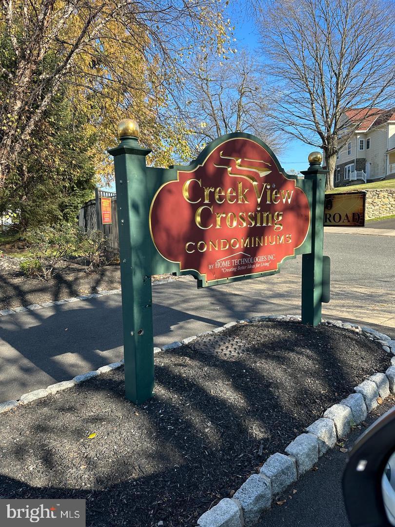 1630 Welsh Road, Unit 3A Philadelphia, PA 19115 - Photo 2 of 14 a view of a wooden fence next to a road