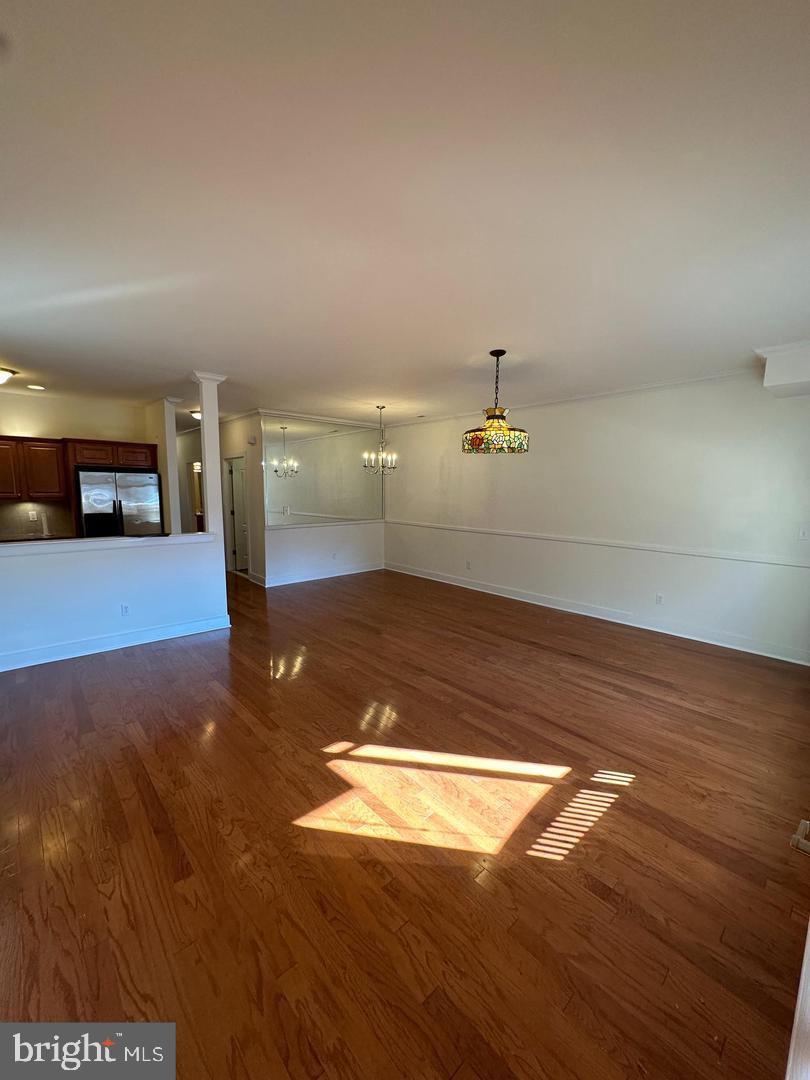 1630 Welsh Road, Unit 3A Philadelphia, PA 19115 - Photo 3 of 14 a view of empty room with wooden floor