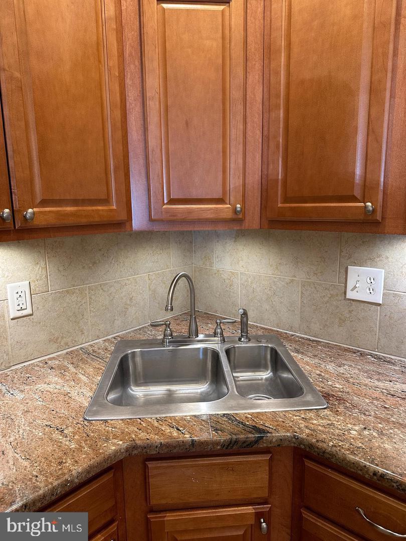 1630 Welsh Road, Unit 3A Philadelphia, PA 19115 - Photo 6 of 14 a close view of sink and tap