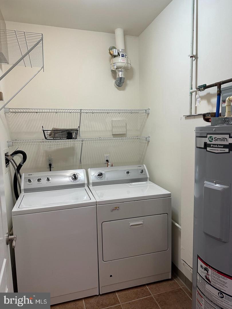 1630 Welsh Road, Unit 3A Philadelphia, PA 19115 - Photo 7 of 14 a utility room with dryer and washer