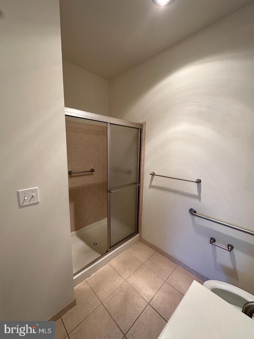 1630 Welsh Road, Unit 3A Philadelphia, PA 19115 - Photo 10 of 14 a bathroom with a shower and toilet