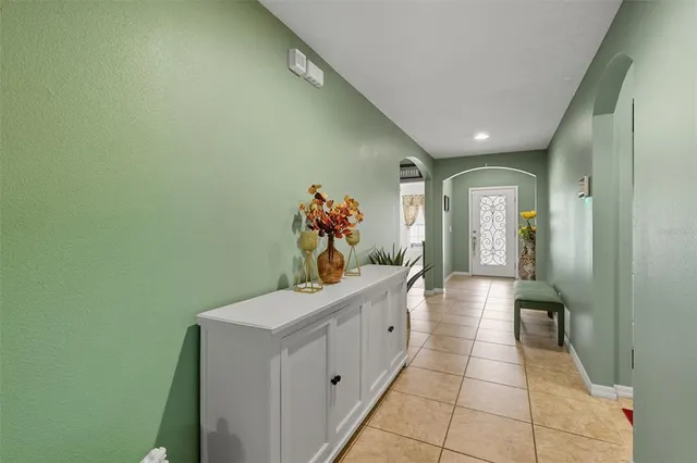 a hallway with cabinets