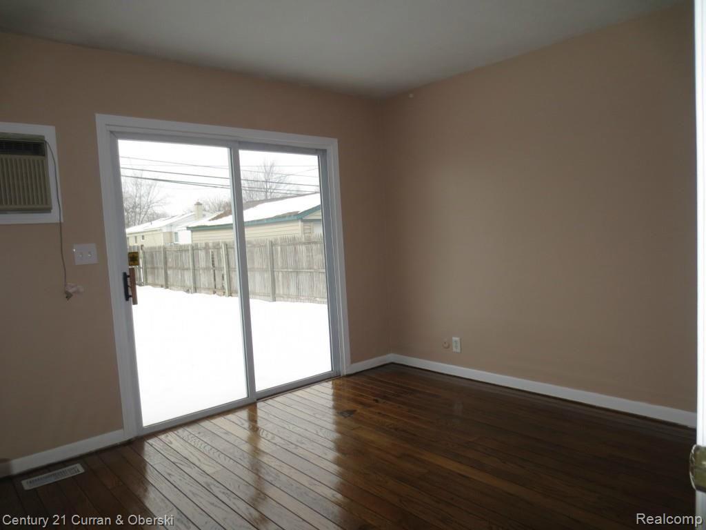 7349 Inkster Road Westland, MI 48185 - Photo 8 of 16 PATIO DOOR WALL IN MASTER BEDROOM