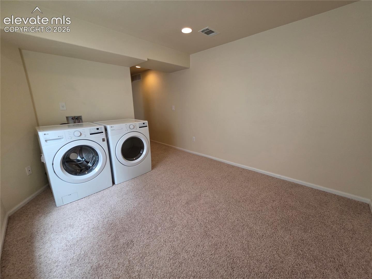874 Diamond Rim Drive Colorado Springs, CO 80921 - Photo 24 of 28 Dedicated laundry area with carpet flooring, neutral wall tones, and recessed lighting