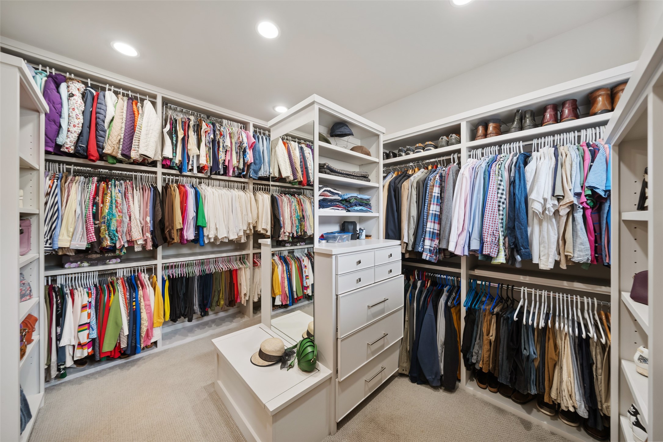 24902 Delaney Knoll Spring, TX 77389 - Photo 19 of 49 a view of walk in closet with clothes and shoes