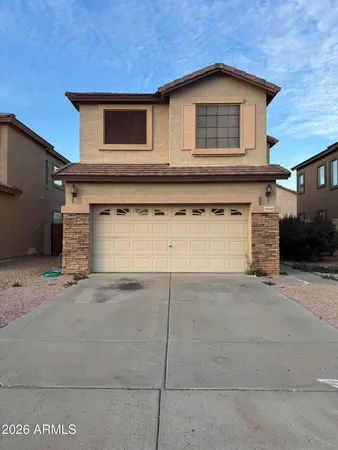 a view of a house with garage