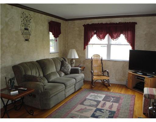 2502 Wigwam Road Aliquippa, PA 15001 - Photo 3 of 18 Living Room. The Living Room has several windows to allow lots of natural light to filter inside.