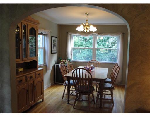 2502 Wigwam Road Aliquippa, PA 15001 - Photo 4 of 18 Dining Room. The arched walkthrough captures the character and elegance of this home.