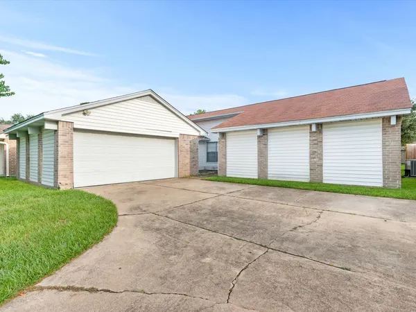 a view of backyard of house garage
