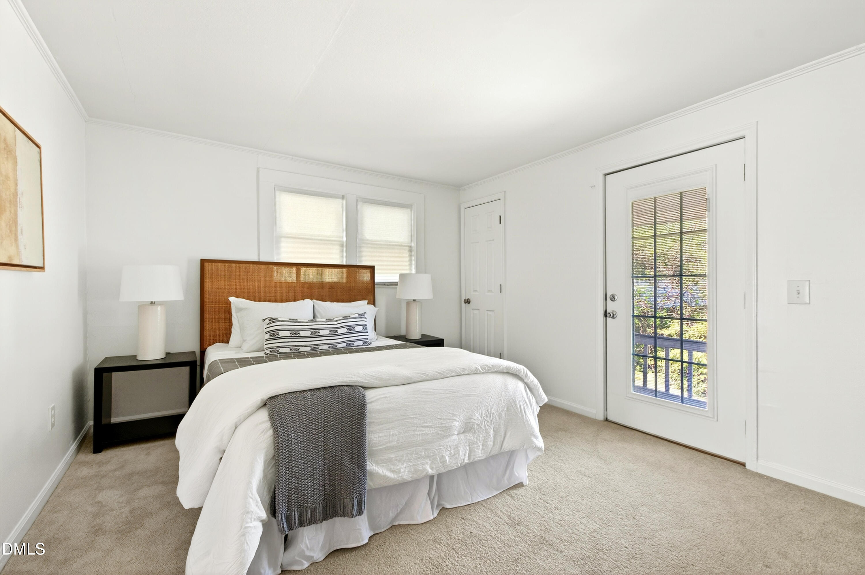 913 Washington Street Durham, NC 27701 - Photo 16 of 37 a bedroom with a bed and a window