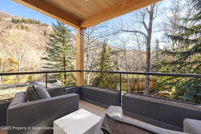 a living room with large windows