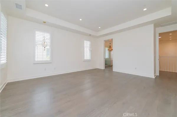 an empty room with windows