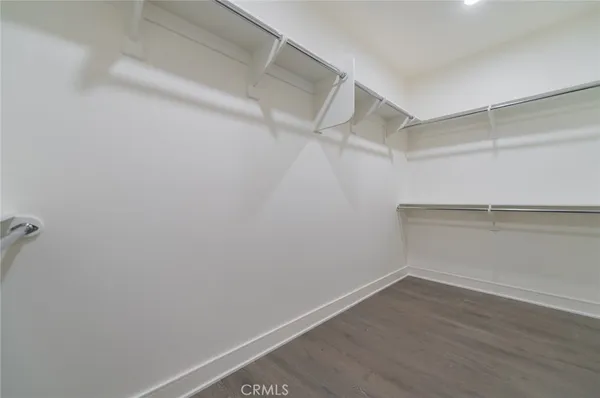 a view of an empty walk in closet