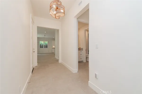 a view of a hallway with elevator