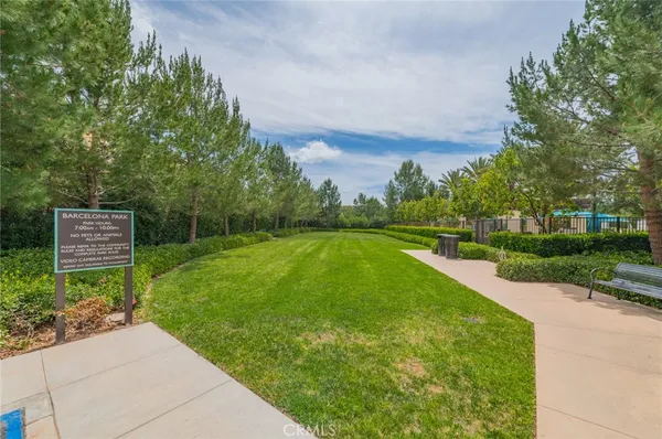 a view of a garden with basketball court