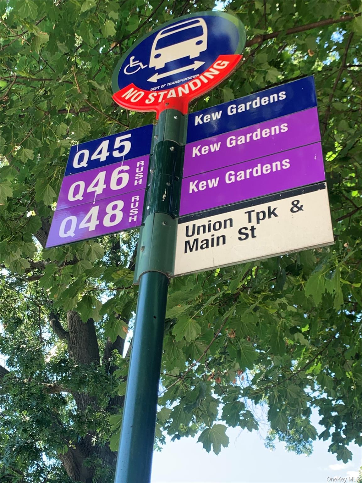 77-04 141st Street, Unit 67F Queens, NY 11367 - Photo 10 of 11 a sign that is on a brick wall