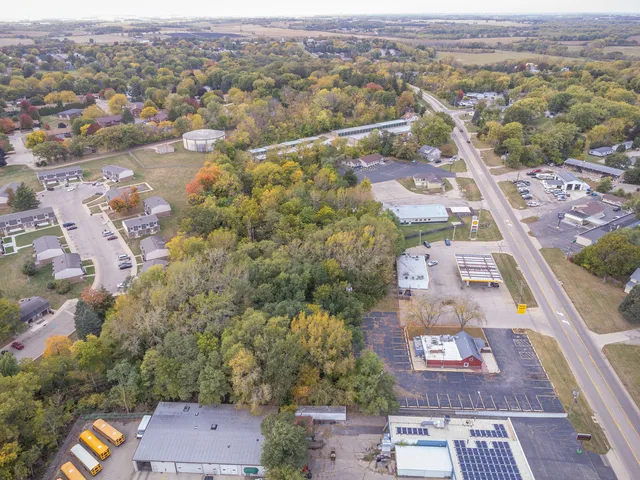 an aerial view of a city and mountain view in back