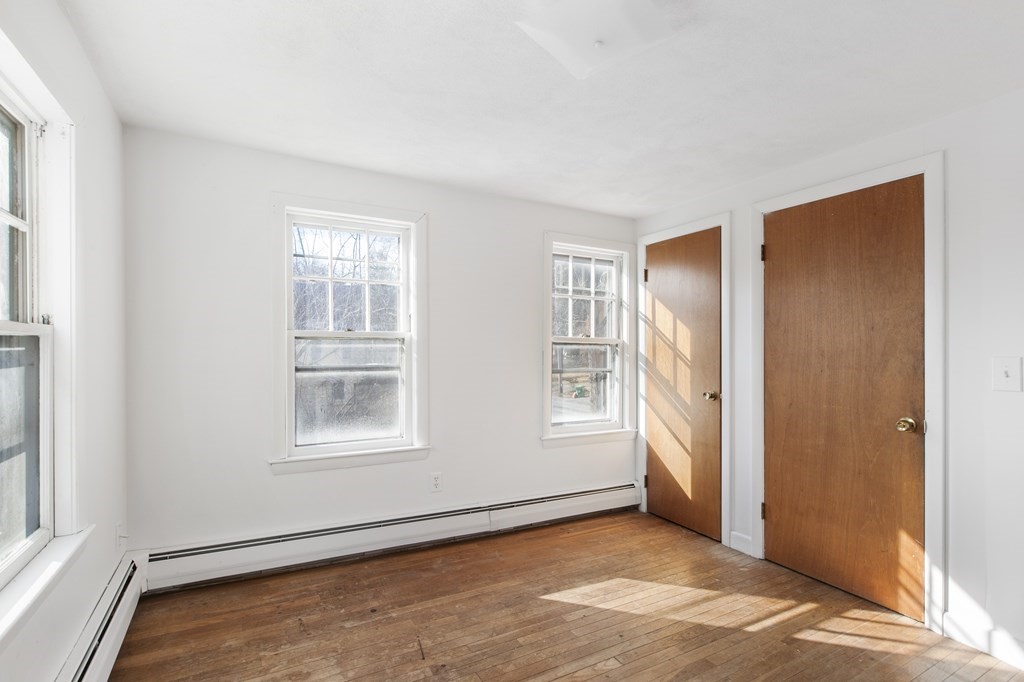 103 Myrtle Street Ashland, MA 01721 - Photo 20 of 38 an empty room with windows